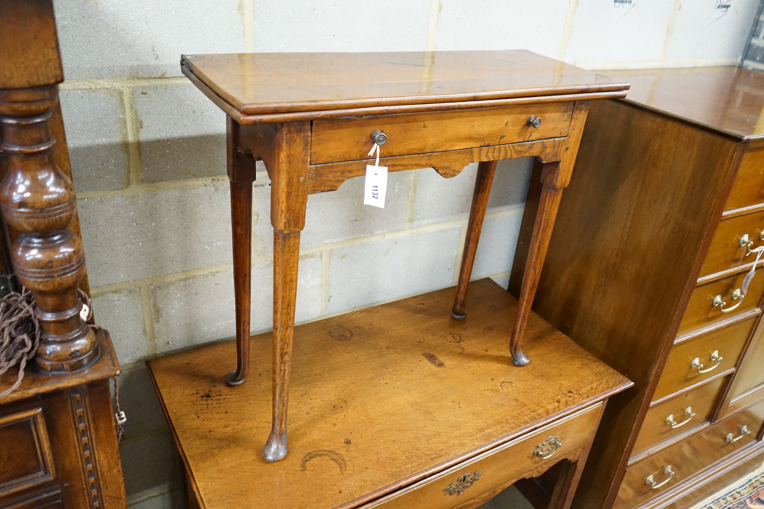 An 18th century provincial yew and oak rectangular folding tea table, width 80cm, depth 31cm, height 72cm